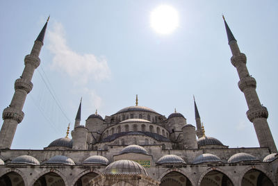 Low angle view of sultan ahmed mosque against sky on sunny day