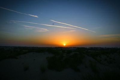 Scenic view of sunset over landscape