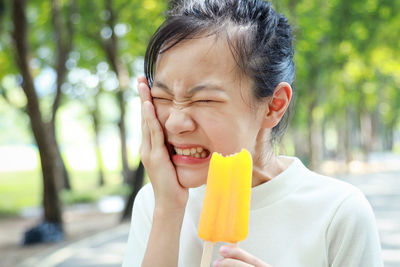 Portrait of man eating ice cream