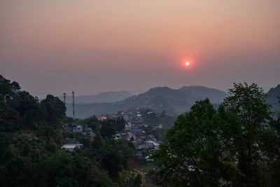 Scenic view of mountains against sky during sunset