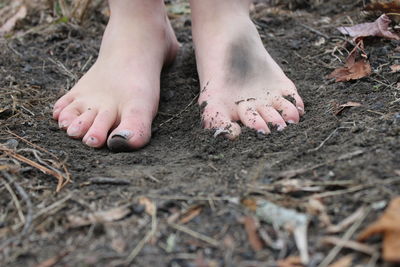 Low section of man feet