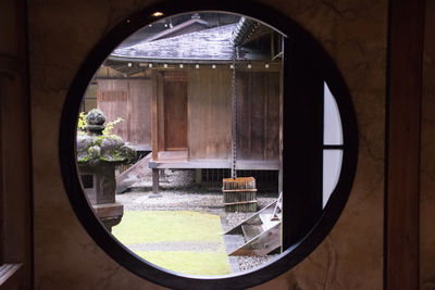 Reflection of window on glass door at home