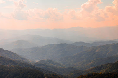 Scenic view of mountains against sky during sunset