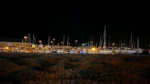 Illuminated beach at night