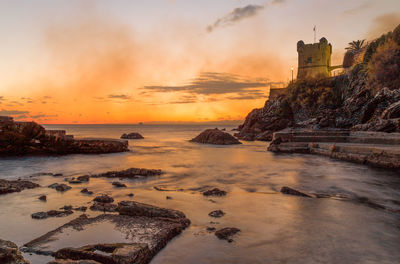 Scenic view of sea against sky during sunset