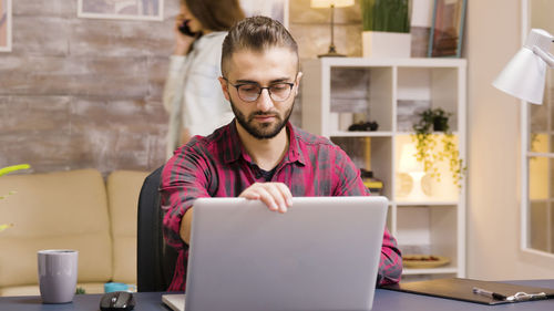 Young businessman working at office