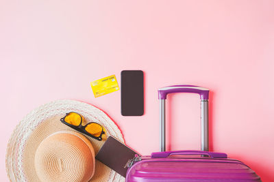 Close-up of pink toys on table against gray background