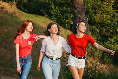 Gen z, friendship, togetherness. three happy girl friends, teenage girls enjoing their tim