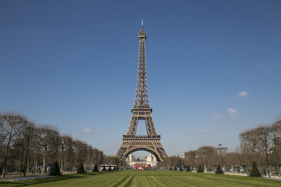 Tower in park against clear blue sky