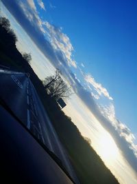 Scenic view of landscape against blue sky