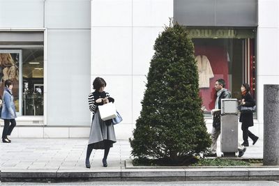 Woman walking in city