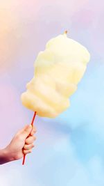 Cropped hand of person holding ice cream cone