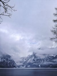 Scenic view of mountains against sky during winter