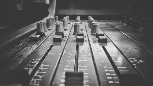 Close-up of sound mixer in studio
