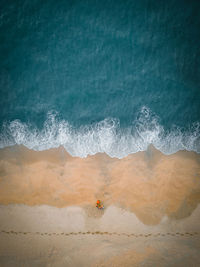 High angle view of beach by sea