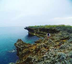 High angle view of calm blue sea against the sky