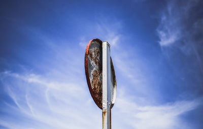 Low angle view of metallic structure against sky