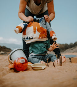 Family scene on the beach.