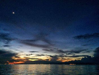 Scenic view of sea against dramatic sky