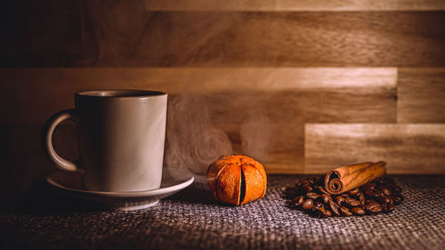 Close-up of coffee cup on table