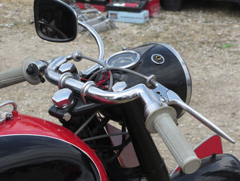 Close-up of motorcycle parked outdoors