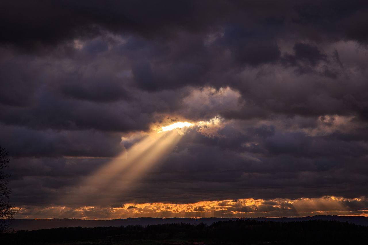 SUNSET OVER LANDSCAPE