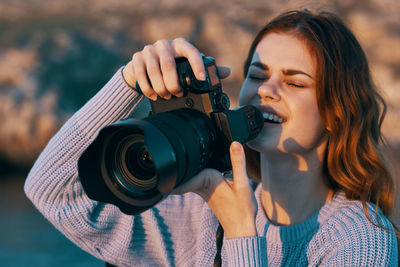 Portrait of man photographing