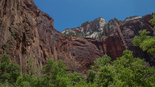 Scenic view of rocky mountains against clear sky