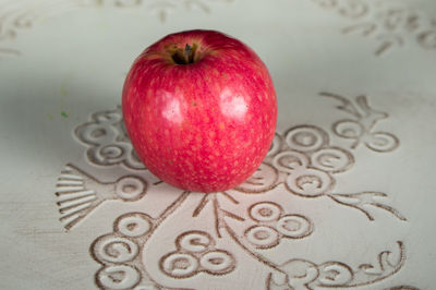Close-up of an apple on table