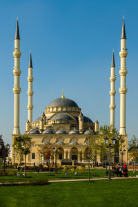 Low angle view of mosque against sky