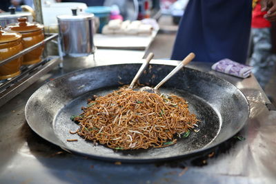 High angle view of noodles on utensil