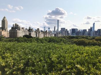 Scenic view of cityscape against sky