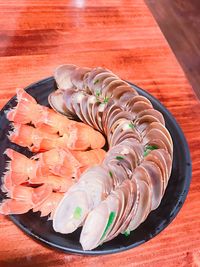 High angle view of fish in plate on table