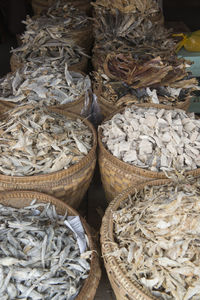 Seafood in baskets for sale at market