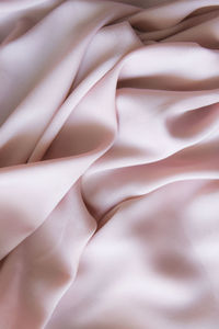 Full frame shot of pink satin textile