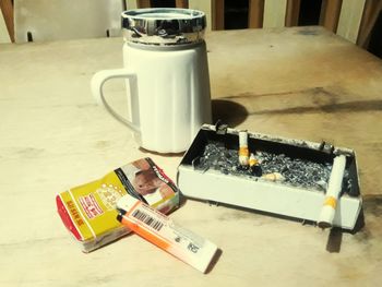 High angle view of cigarette on table