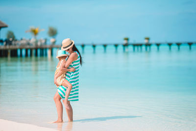 Full length of woman on beach