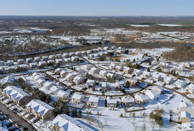 High angle view of buildings in city during winter