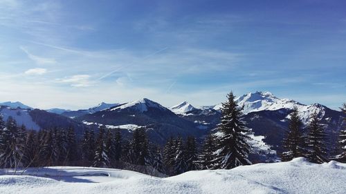 Snowcapped mountains against sky