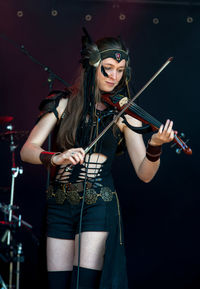 Young woman wearing mask