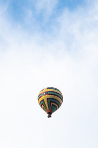 Low angle view of hot air balloons against sky