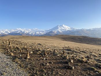 Scenic view of snowcapped mountains against sky