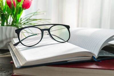 Close-up of eyeglasses on table