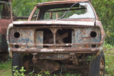Abandoned truck on field