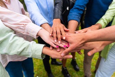 Low section of people with hands