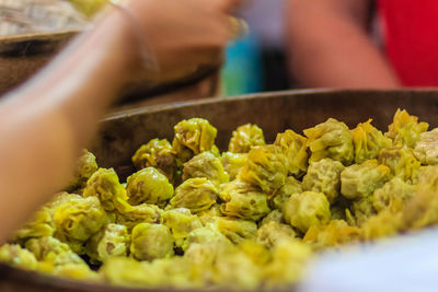 Close-up of hand holding food