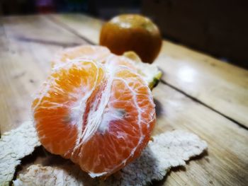 Close-up of orange slices on table