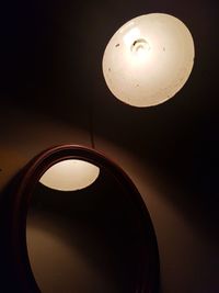 Low angle view of illuminated pendant light