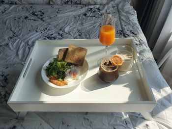 High angle view of breakfast served in bed