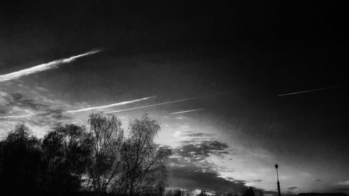 Low angle view of vapor trails in sky